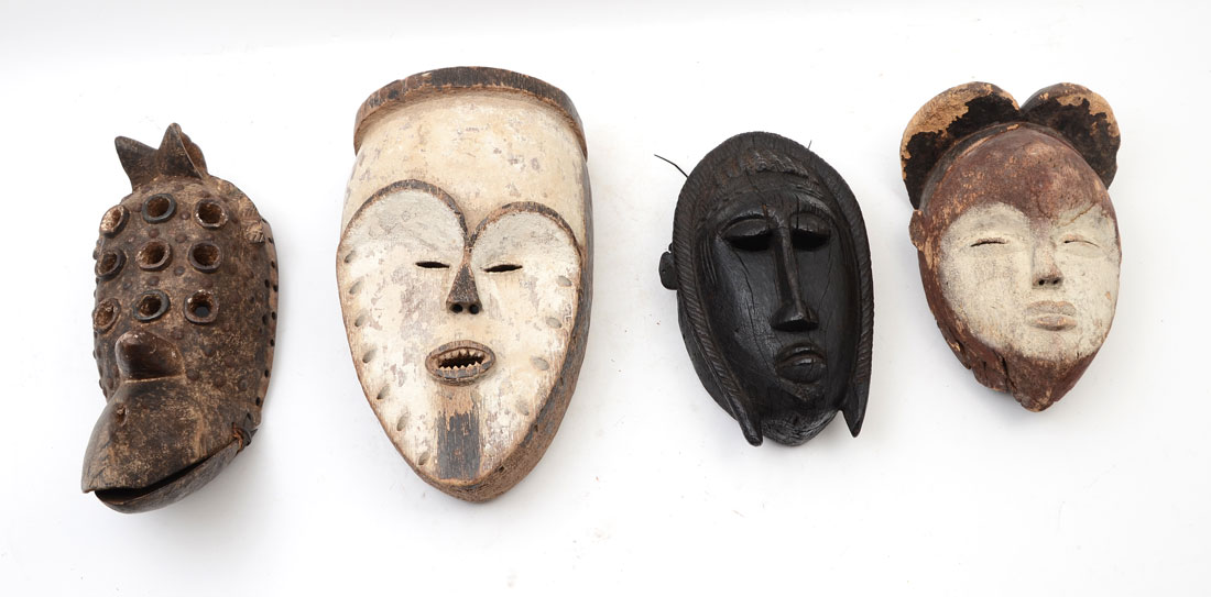 Appraisal: COLLECTION OF CARVED AFRICAN MASKS A collection of masks total