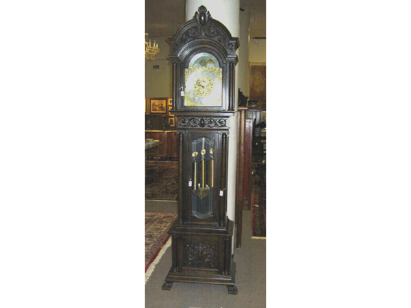 Appraisal: AMERICAN OAK CLASSICAL STYLE TALL CASE CLOCK With a large