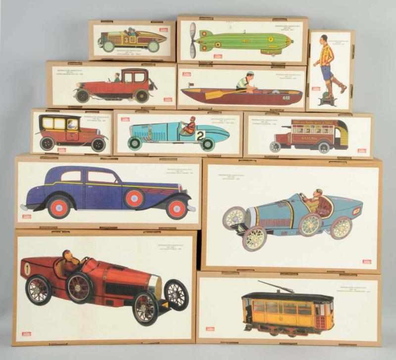 Appraisal: Lot of Contemporary Paya Vehicle Toys Description Unused and include