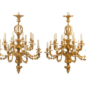 Appraisal: A Pair of Louis XV Style Gilt Bronze Sixteen-Light Chandeliers