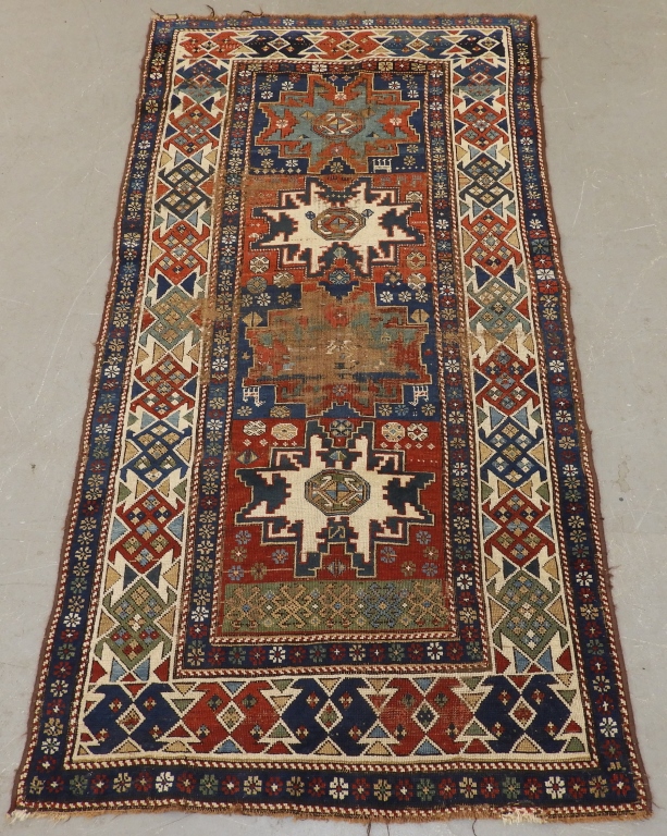 Appraisal: CAUCASIAN GEOMETRIC PATTERN WOOL CARPET RUG RUNNER Caucasian th CenturyThree