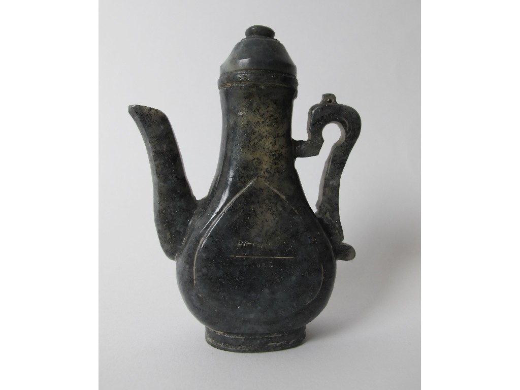 Appraisal: A Chinese spinach green jade miniature ewer of flattened form