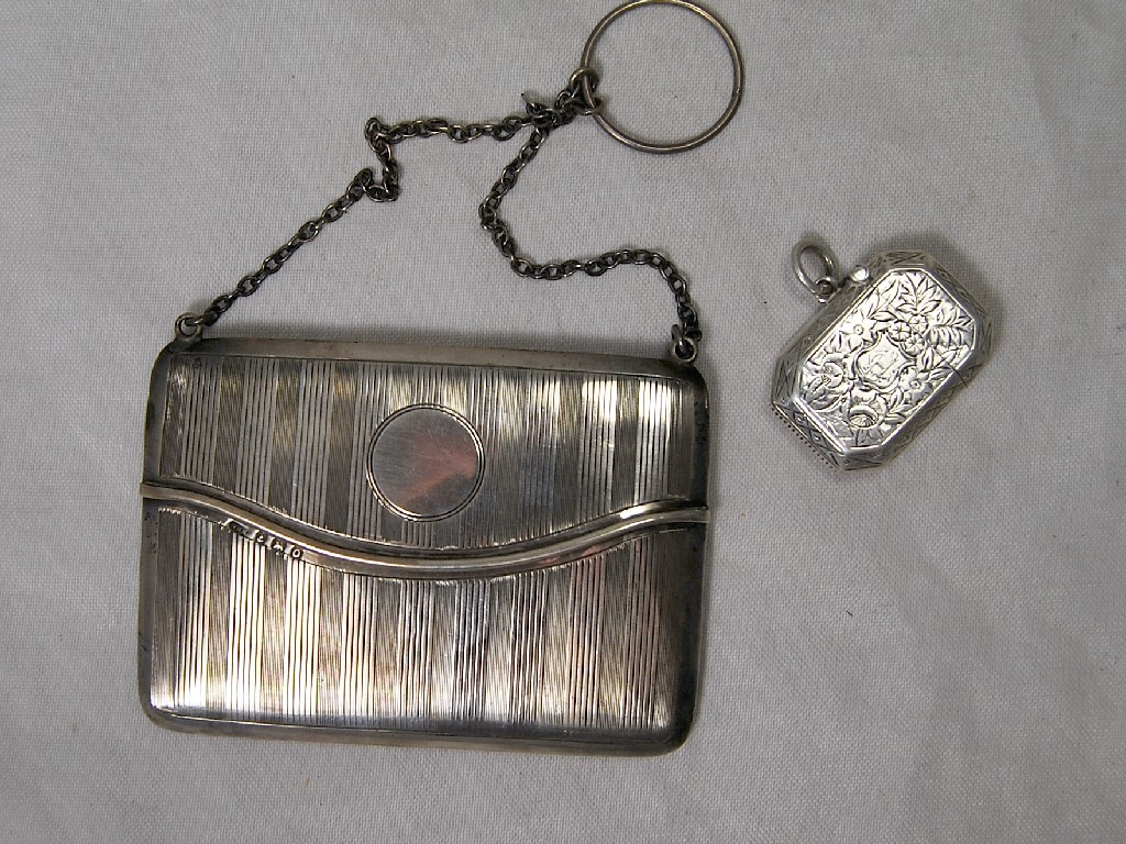 Appraisal: Lady's rectangular engine turned silver card case having sprung spring