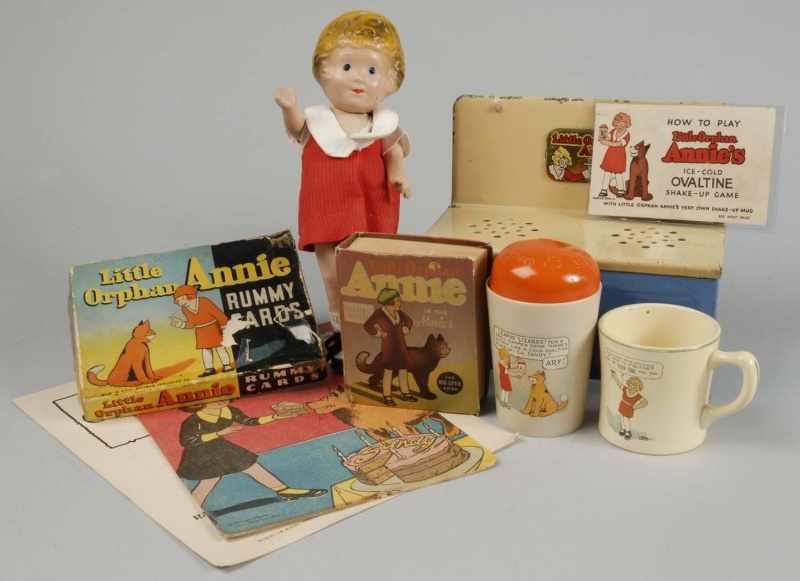 Appraisal: Lot of Little Orphan Annie Collectible Pieces Description Composition doll