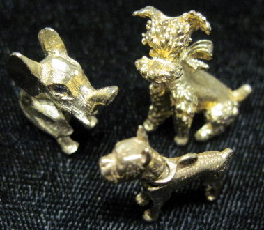 Appraisal: Group of three karat yellow gold animalsIncluding a bulldog with