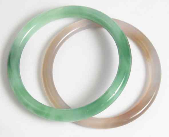 Appraisal: TWO ROUND JADE CHINESE BANGLES weighing grams and grams and