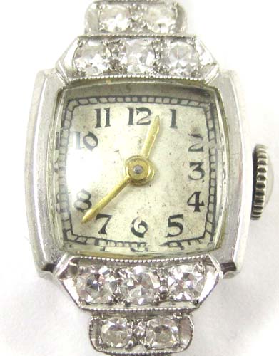 Appraisal: LADY'S VINTAGE DIAMOND AND PLATINUM WRISTWATCH having a Swiss -jewel