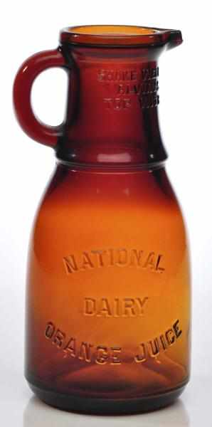 Appraisal: Brown Glass National Dairy Orange Juice Bottle Description Nicely embossed