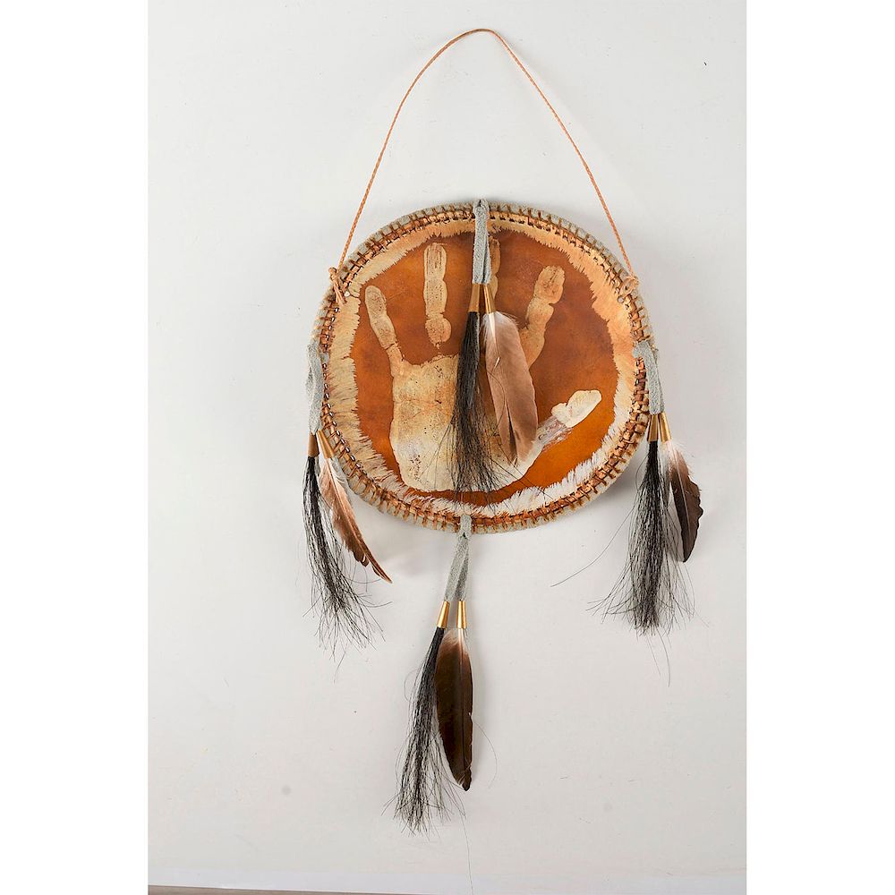 Appraisal: NATIVE AMERICAN TRIBAL WHITE PALM HIDE SHIELD Hardened tanned leather