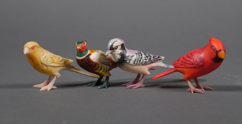 Appraisal: Finely carved polychrome Japanese ivory birds Fine condition Largest measures