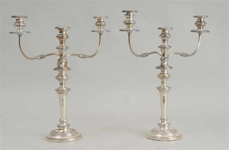 Appraisal: PAIR OF ENGLISH SILVER-PLATED THREE-LIGHT CANDELABRA Each with three impressed