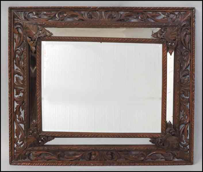 Appraisal: CARVED MAHOGANY MIRROR '' x '' Condition No Specific Condition