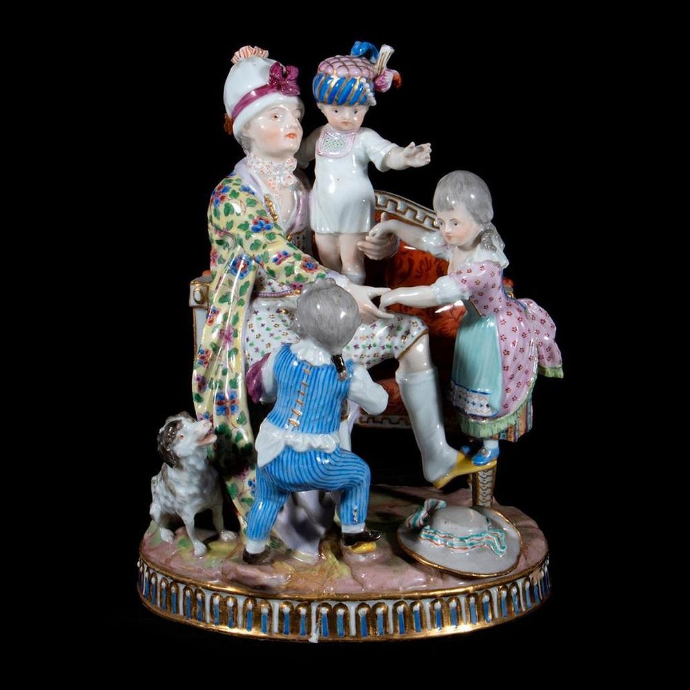 Appraisal: Dresden Porcelain Figural Group Depicting a playful familial group in