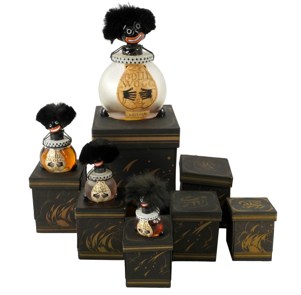 Appraisal: SEVEN FRENCH GOLLIWOG PERFUME BOTTLESVigny Paris glass and ceramic each