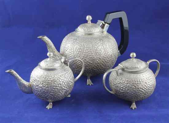 Appraisal: Two Indian graduated white metal teapots and a similar pot