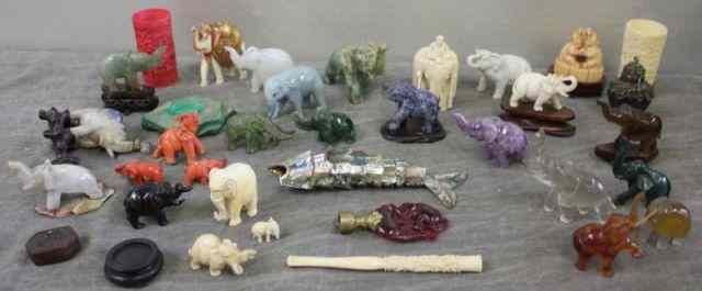 Appraisal: Vintage Miniature Elephant and Ivory Collection Includes coral one possibly