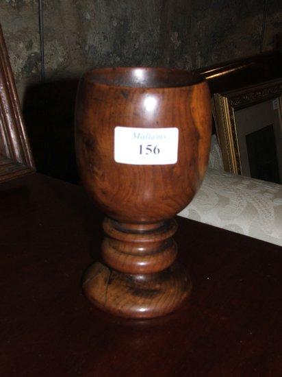 Appraisal: A TREEN YEW WOOD GOBLET on turned double knopped stem