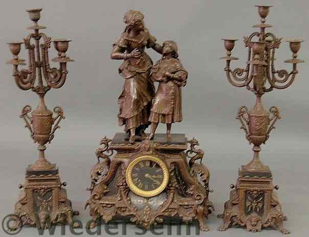 Appraisal: Victorian Spelter metal clock and pair of matching garnitures clock