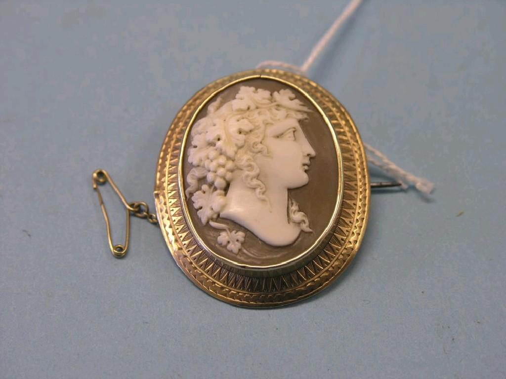 Appraisal: A Victorian yellow metal cameo brooch carved portrait bust with