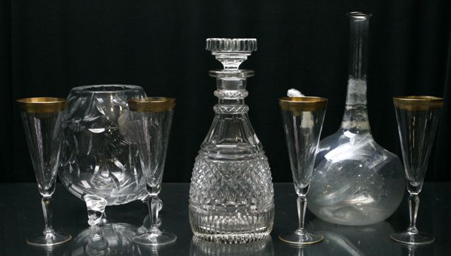 Appraisal: A cut crystal decanter cms high together with a cut