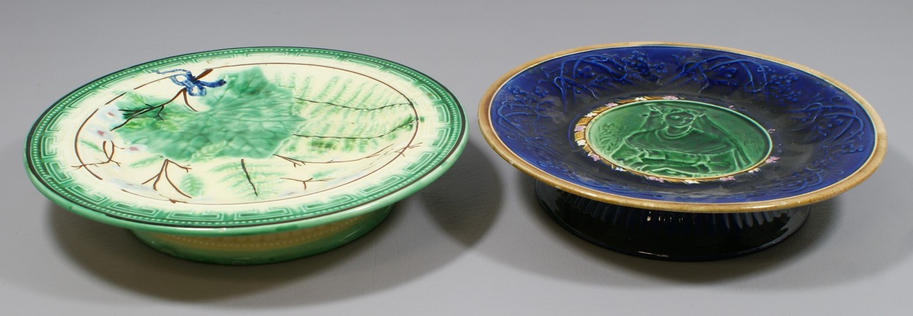 Appraisal: majolica low compotes one with blue border around cameo center