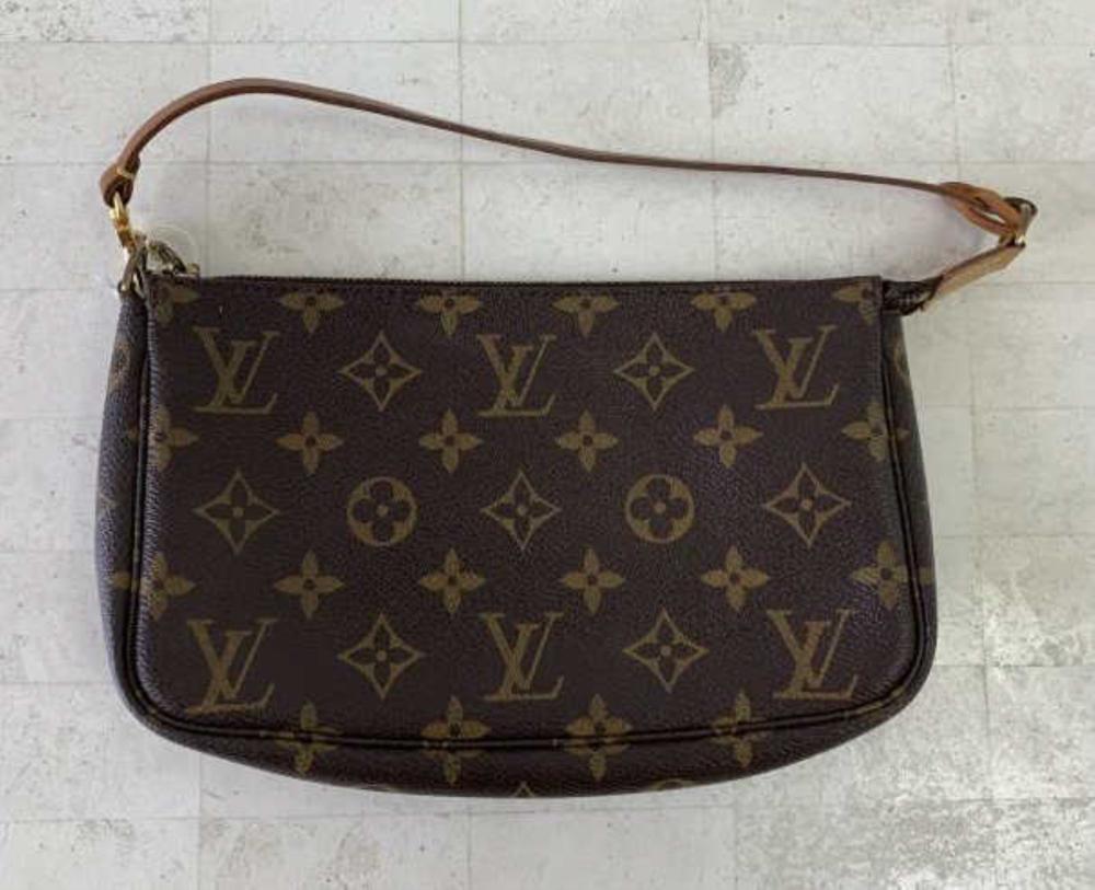 Appraisal: LOUIS VUITTON BROWN ACCESSORY POUCHLouis Vuitton brown Accessory Pouch monogram