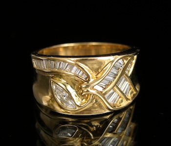 Appraisal: An k Gold Band with Diamonds k yellow gold band