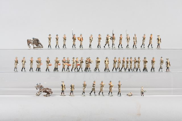 Appraisal: Lot of metal figures Polish Infantry marching together with miscellaneous