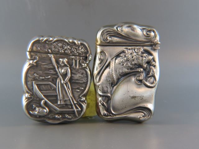 Appraisal: Match Safes lion and lady in boat Sterline and Bristol