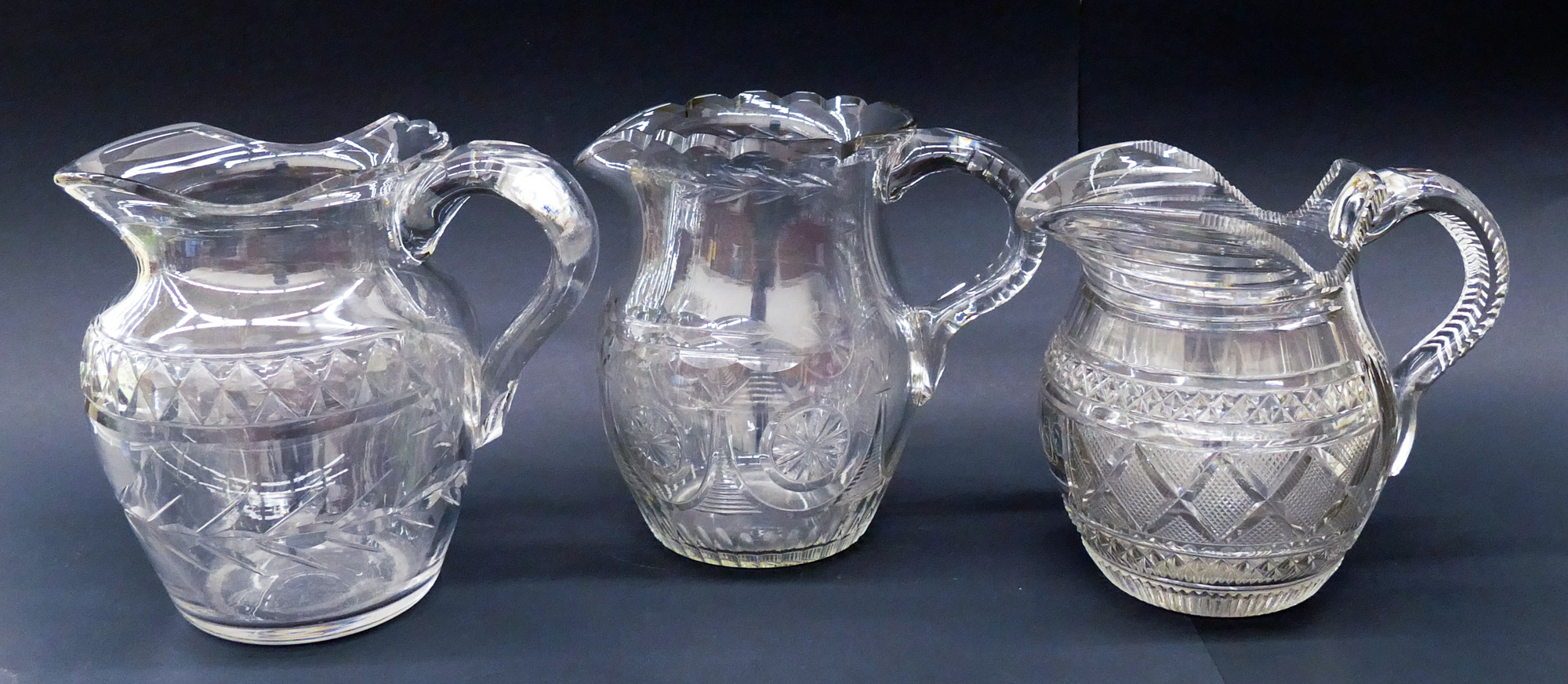 Appraisal: pc Georgian Cut Crystal Water Jugs Includes Diamond Husk Banded