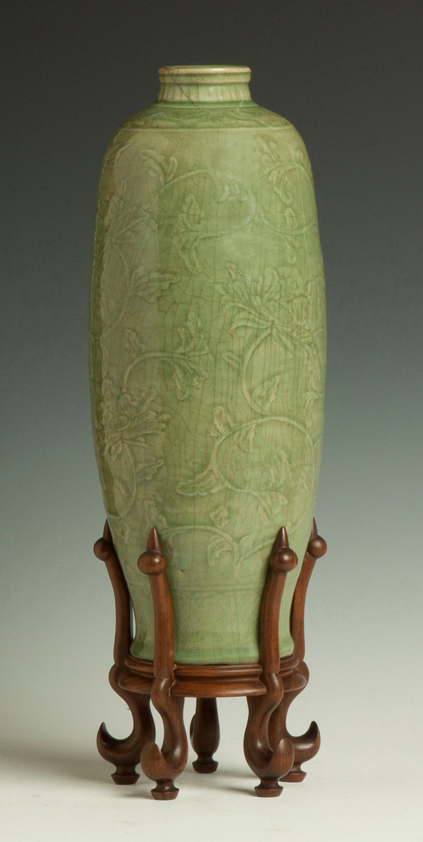 Appraisal: Early Chinese Celadon Meiping Vase Ming period Incised floral decoration