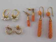 Appraisal: A mixed lot comprising two pairs of coral drop earrings