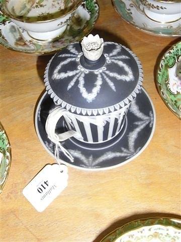 Appraisal: A WEDGWOOD BLACK AND WHITE BASALT CABINET CUP with cover