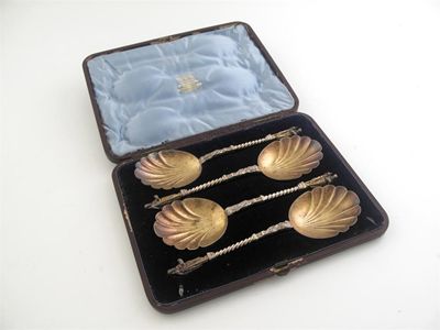 Appraisal: A cased set of four Victorian parcelgilt fruit serving spoons