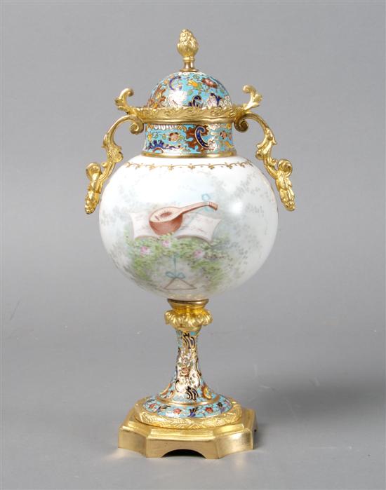 Appraisal: A Continental Porcelain Gilt-Metal and Champleve Mounted Urn and Cover