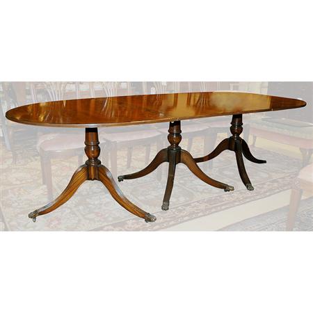 Appraisal: George III Style Mahogany Triple-Pedestal Dining Table Estimate -