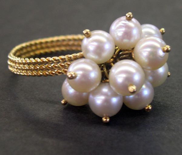 Appraisal: Fourteen-Karat Yellow Gold and Pearl Flowering Grape Cluster Ring containing