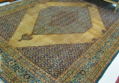 Appraisal: SEMI-ANTIQUE PERSIAN CARPET with Herati floral motif filling all areas