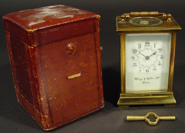 Appraisal: Brass cased carriage clock with bevelled glass panels and enamel