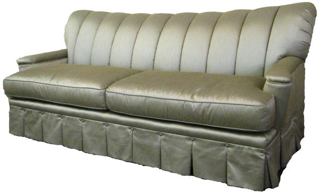 Appraisal: Century two-cushion sofa with channel back upholstery full skirt and