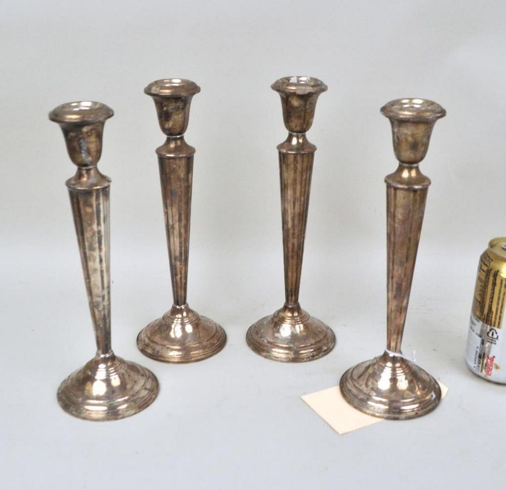 Appraisal: Set Four Cartier Weighted Sterling Candlesticks on a reeded tapered