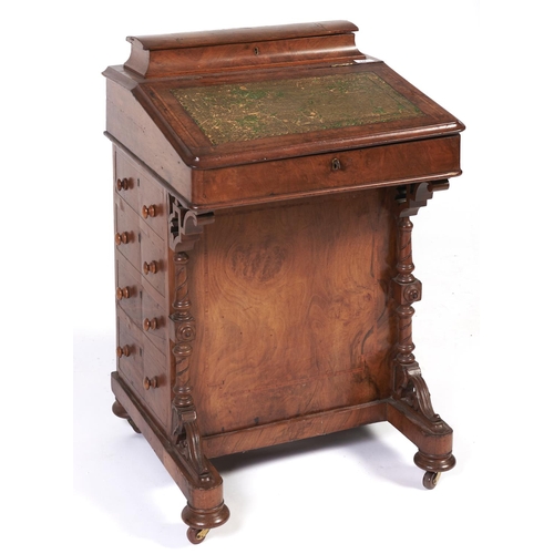 Appraisal: A Victorian walnut Davenport c crossbanded and line inlaid with