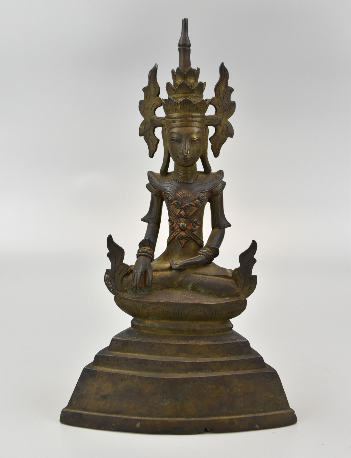 Appraisal: A bronze Thai Buddha th C sits crossleged on a