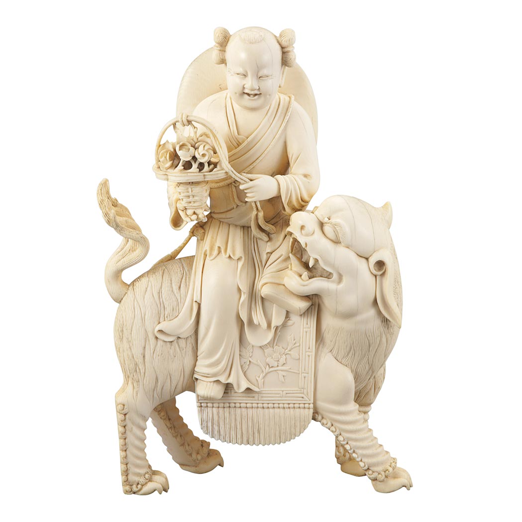 Appraisal: Chinese Ivory of a Boy on a Qilin Late th