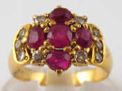 Appraisal: A yellow metal tests carat gold ruby and diamond ring