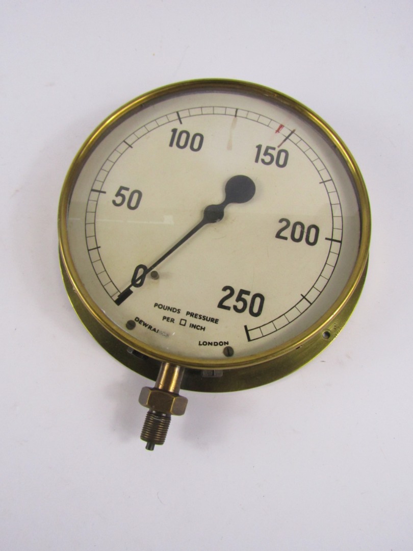 Appraisal: A thC Dewrance brass cased pressure gauge taken from the