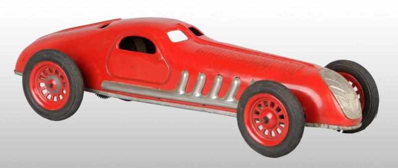 Appraisal: Tin Jep Boat Tail Race Car Clockwork Toy Description French