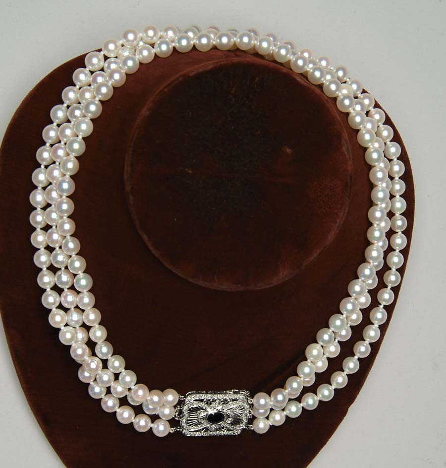 Appraisal: THREE STRAND CULTURED PEARL NECKLACE Very lovely cultured in pearl