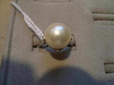 Appraisal: PLATINUM PEARL AND DIAMOND RING C 'S Platinum and cultured