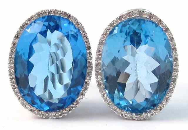 Appraisal: PAIR OF BLUE TOPAZ AND DIAMOND EARRINGS each k white